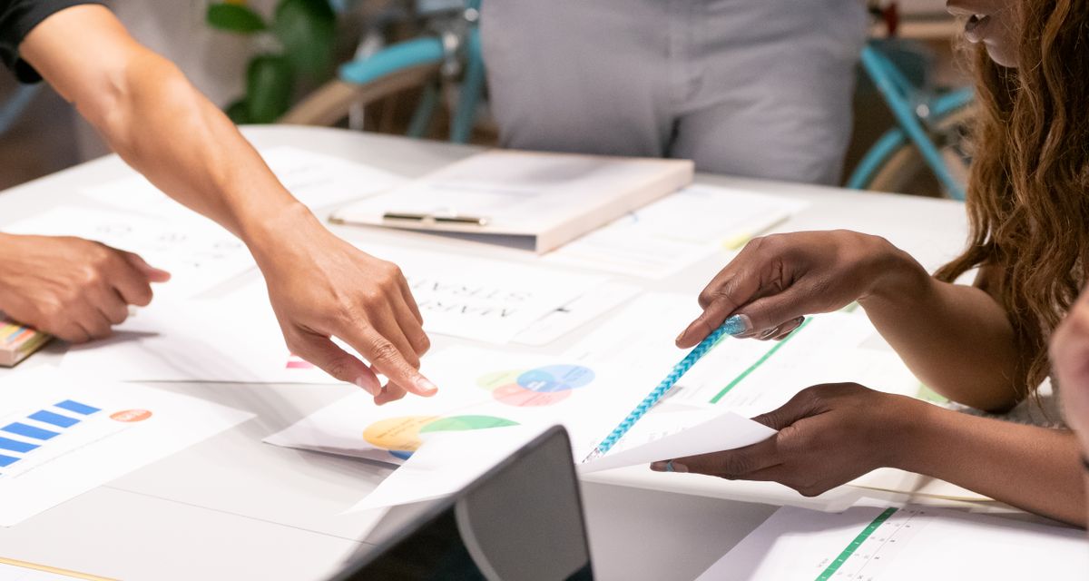 Marketing team reviewing performance charts